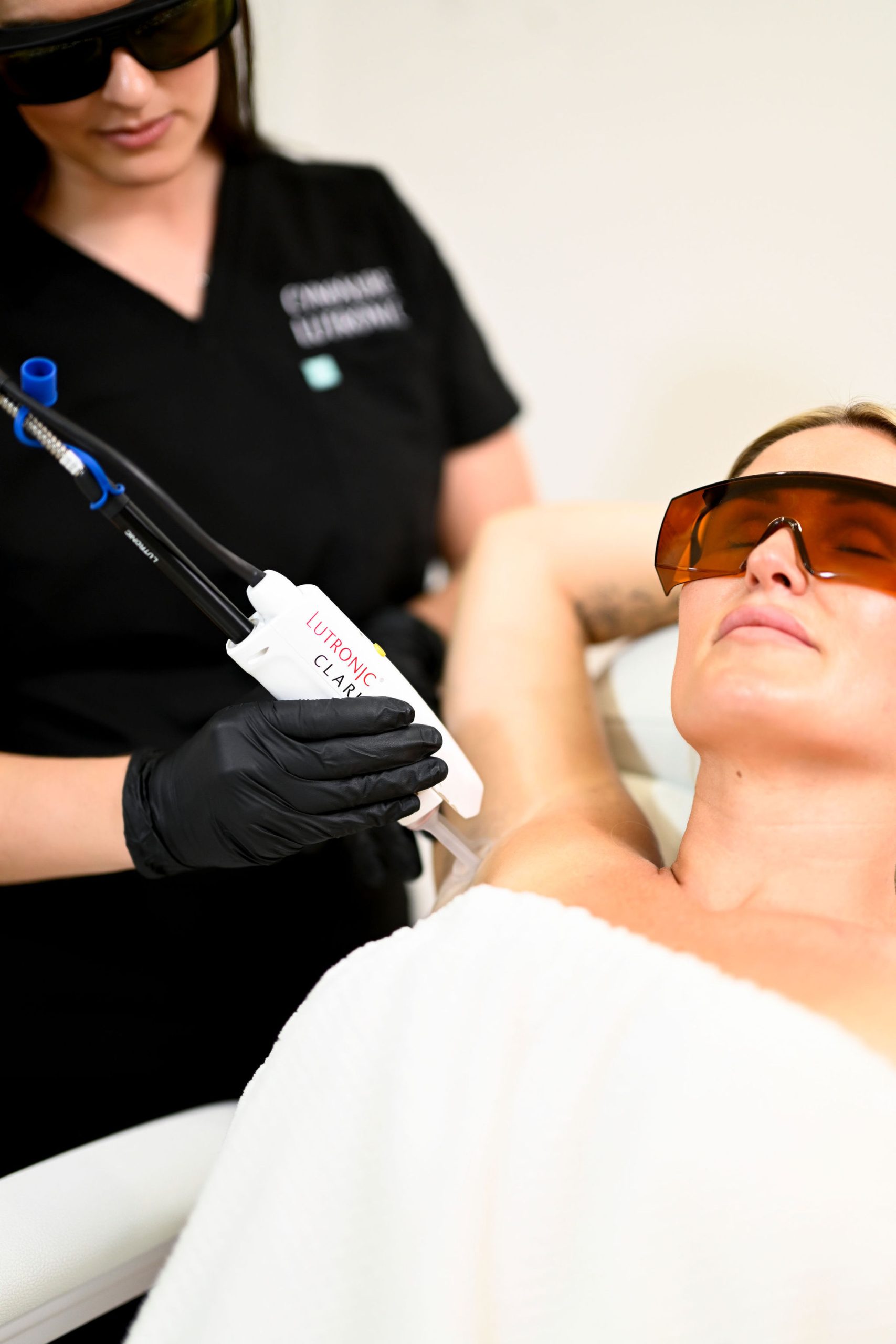 woman receiving laser hair removal under arms in arnprior ontario